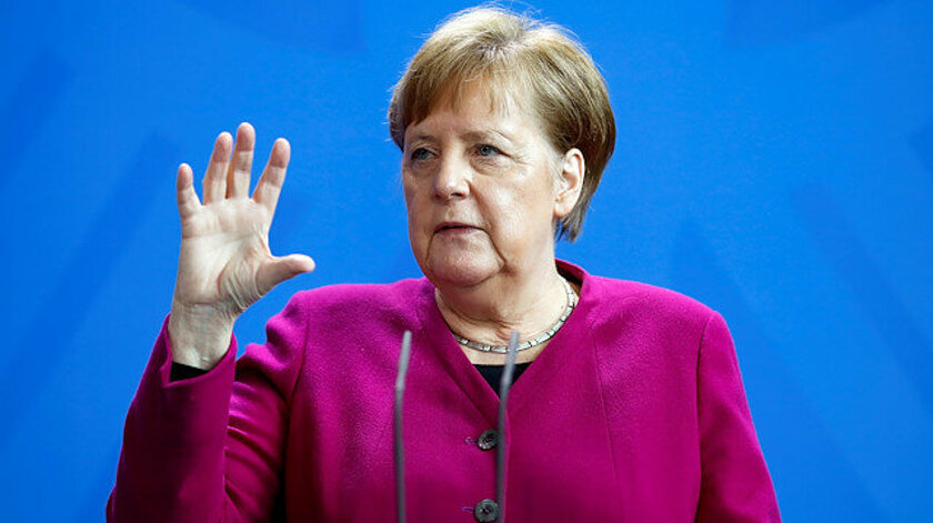 Merkel’den “yavaş olun” uyarısı